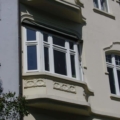 Balkonverglasung als Holz Erkerfenster